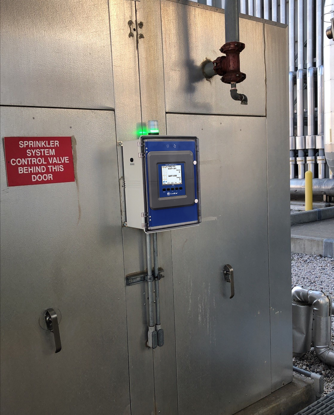ConsoliDator+ mounted in power plant facility near an ammonia storage tank.